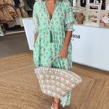 MANA | MIDI-JURK MET FLORALE PATROON EN V-HALS