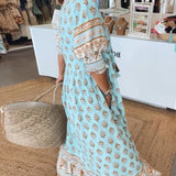 MANA | MIDI-JURK MET FLORALE PATROON EN V-HALS