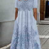 INDIGO | ROBE MIDI ÉLÉGANTE À MOTIF FLEURI
